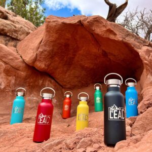 silver-capped Lead Your One Life water bottles