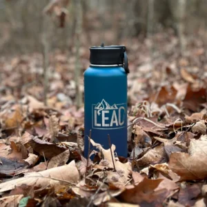 Multi-green Lead Your One Life water bottle in leaves