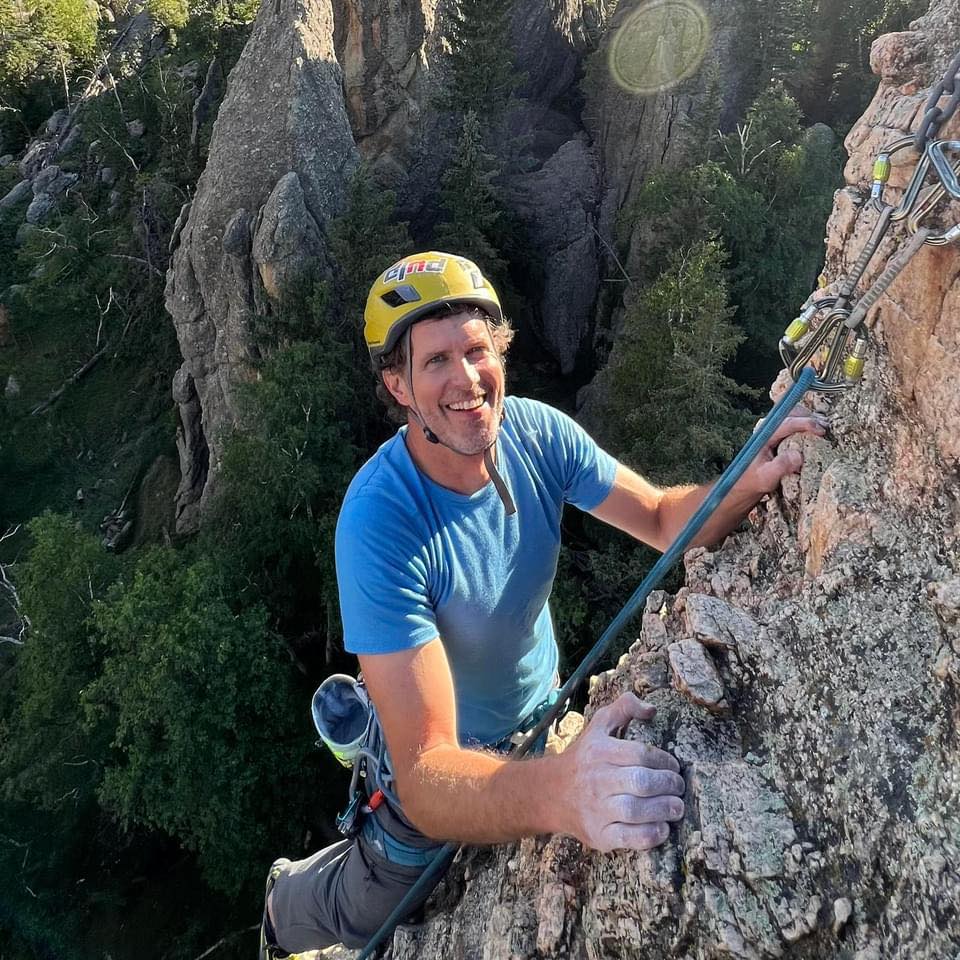 Man climbs mountain